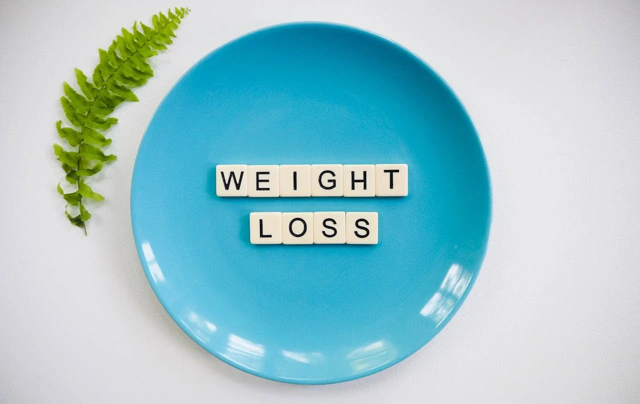 Blue plate with weight loss letters