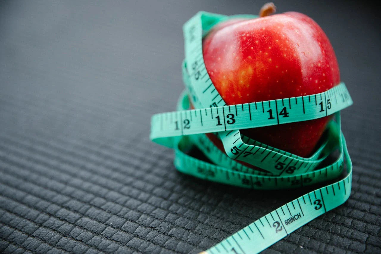 Weight belt wrapped around an apple
